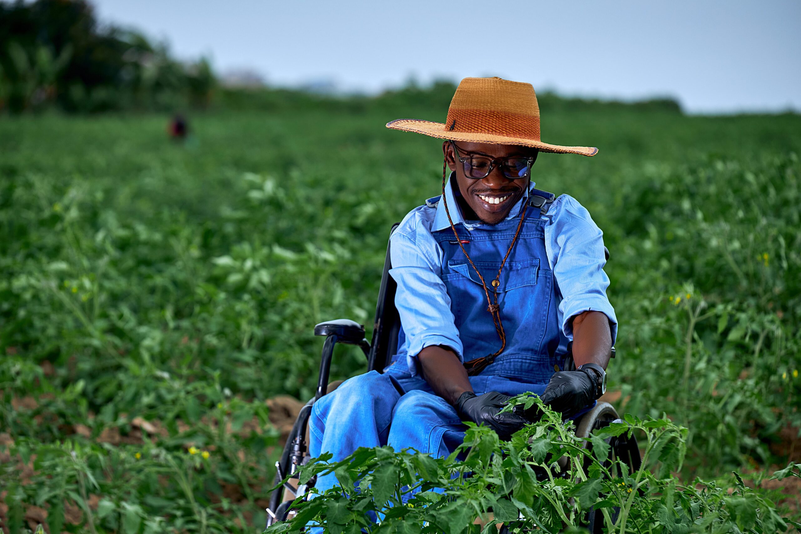 Smiling woman in greenhouse